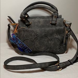 Grey suede purse with detail on front